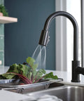 Three-Function Pull-Down Kitchen Faucet With POWERinse Technology Delivers Extra Cleaning Power, High-Arc Gooseneck Design