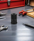 Dual End Engine Barring Socket Wrench Shop Tested For Cat 3200 And 3406 Series Engines on workbench surrounded by tools.