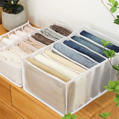 Wardrobe Upgrade Alert Killer 7 Grid Pants Organizer Box For Closet Drawer Sorter displaying stacked trousers in seven slots.