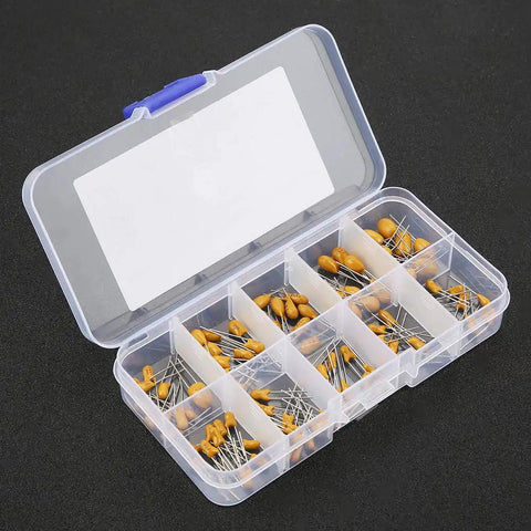 Badass Tantalum Capacitor Assortment Kit Featuring Ten Value Variations In A Nifty Labeled Storage Box, displaying a plastic container with assorted capacitors.