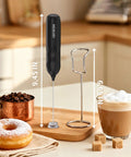 Two Pack Handheld Milk Frother With Stand For Lattes Cappuccinos Matcha And Hot Chocolate Go To Valentines Day Gift For Him And Her Black And White shown on kitchen counter