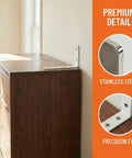 Close-up of Heavy Duty Furniture Wall Anchors Rock Solid Baby Proofing Kit on dresser corner, stainless steel material.