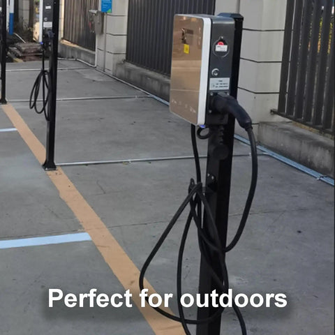 Tough As Nails Galvanized Steel EV Charger Station Box Outdoor Weatherproof Cable Organizer Cabinet With Pre Drilled Mounting For Garage Or Business Parking Lot Black mounted in a parking area.