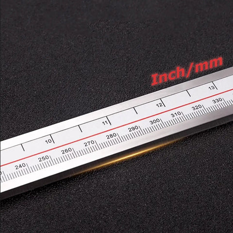 Built Tough Heavy Duty 40 Inch Digital Caliper With Extended Long Jaw For Deep Reach and Spot On Id Or Od Measurements In Metric And Imperial Units Featuring A Snappy Lcd Display close-up of measurement scale in inches and mm on caliper.