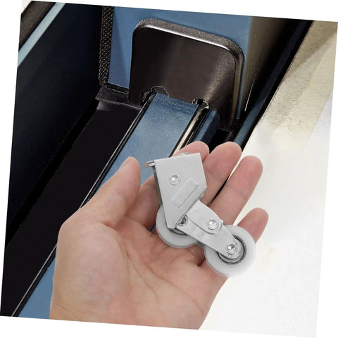 4PC Premium Aluminum Alloy Sliding Door Pulley Wheels With Ball Bearing Replacement Rollers in hand, showing smooth glide design.