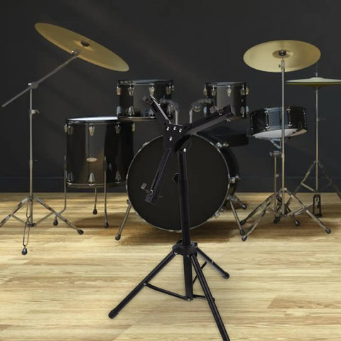 Knockout Foldable Snare Drum Stand With Heavy Duty Tripod Base Silent Practice Holder Fits 12 Inch Drum in a garage setting.