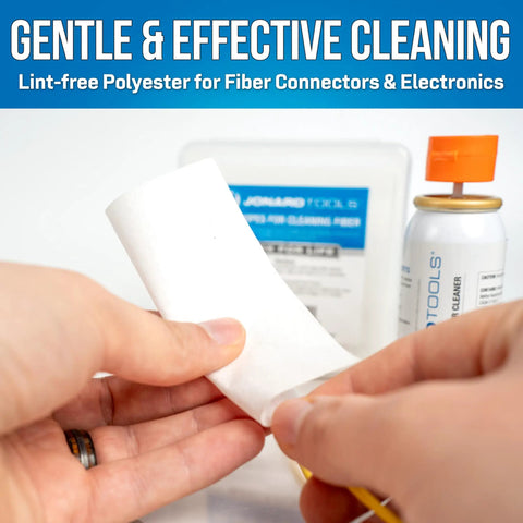 Hands using 90 Count Dry Wipes For Cleaning Bare Fiber, Connector End Faces, And Electronic Components, Lint Free Polyester Wipes In A Durable Mini Jar For Easy Debris Free Maintenance, with cleaning tools in the background.