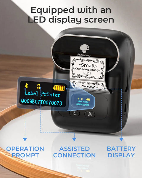 Bluetooth Portable Label Printer For Small Biz Fast Thermal Label Maker For Barcodes Addresses Clothing Pricing Mail Jewelry Cables And More Works With Phone And PC, displaying an LED screen and printed label.