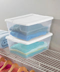 Stackable Clear Plastic Storage Bins 16 Quart 24 Pack holding folded clothes on a closet shelf for organized storage.