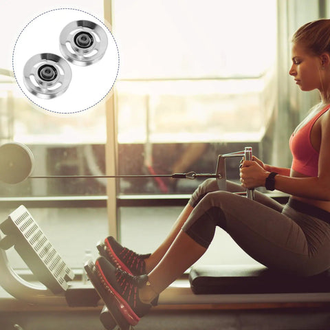 Heavy Duty Replaceable Cable Pulley Wheels 10 Pack Smooth As Butter Aluminum Alloy Lifting Blocks Tough As Nails For Friction Reduction in gym setting.