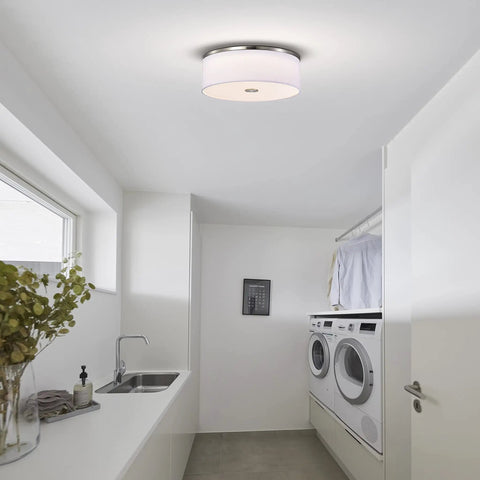 Totally Sleek Modern Flush Mount Ceiling Light With Brushed Nickel Drum Linen Shade in a laundry room setting
