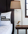 Madison Side Table With Built In Lamp, Wireless Charging Pad And USB Port, shown beside bed with easy assembly feature.