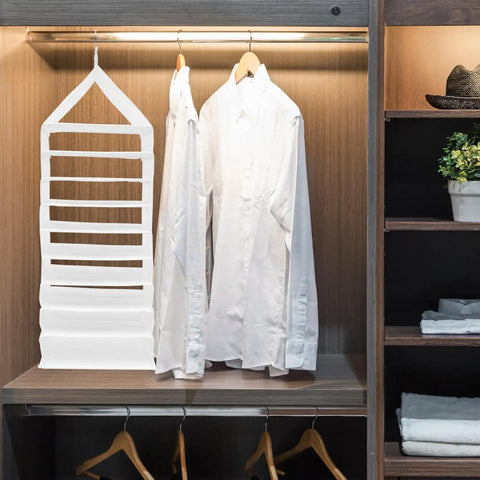 Nine Compartment Hanging Closet Organizer With Heavy Duty Hook And Washable PVC Fabric For Super Handy Clothes Storage Multi Layer Wardrobe Bag To Keep Your Dresser Clutter Free And Hassle Free hanging next to white shirts in modern closet