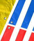 Colorful swing set canopy tarp detail with grommets, featuring yellow, blue, and red sections, 52 by 90 inches.