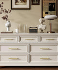25 Pack 3 Inch Gold Cabinet Handles Solid Zinc Alloy Pulls For Kitchen Cabinets And Drawers on a stylish dresser in a living space.