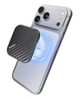 MagSafe Compatible 1TB Magnetic External SSD For iPhone And Mac attached to iPhone 15 with glowing magnetic connection