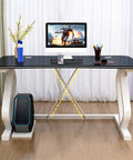 Solid Multifunction Computer Desk With Nifty Cable Management Hole Ergonomic Arched Edge Compact Gaming Workstation Total Game Changer For Tiny Rooms Waterproof Black Surface 47 Inches Wide with computer and accessories.