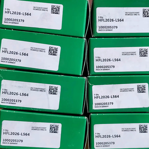 High Strength One Way Needle Roller Clutch Bearing Hfl2026L564 boxes stacked, green packaging, made in Germany.