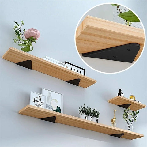 Heavy Duty Floating Shelf Brackets Four Pack Concealed Metal Triangle Wall Mounts showing wood shelves with black brackets.