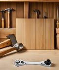 Real Deal Mini Double Ended Socket Ratchet Wrench With A Sweet Quick Direction Flip For Cranking Hex Fasteners In Those Awkward Tight Squeezes Around The Garage Shed on a workshop table.