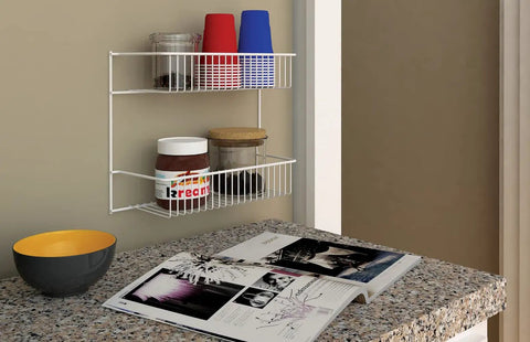 Slick Two Tier Wall Rack For Cabinet Doors And Walls, Heavy Duty Epoxy Coated Steel Storage Shelf In Crisp White displaying jars and cups.