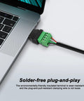 Slick USB To Four Pin Screw Terminal Block Adapter For Quick Cable Extensions And No Sweat Project Hookups plugged into a laptop.