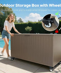 Woman moving 150 gallon outdoor storage box with wheels for patio, waterproof and UV resistant, heavy duty chest, brown.