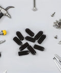 10 Piece Heavy Duty Carbon Steel Set Screws With Spring Loaded Ball Gripper Ends For Rock Solid Clamping displayed with tools on a workspace.