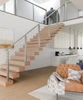 Top Shelf 20 Pack 1/8 Inch Invisible Cable Railing Kit Crafted From T316 Stainless Steel Rock Solid Fittings overlooking modern staircase.