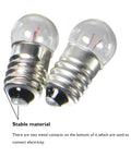 Close-up of E10 3.8V warm white miniature screw base bulbs, stable material for flashlight refills and gauges.