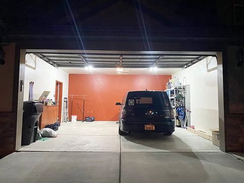Adjustable Deformable LED Garage Lights With Five Flexible Panels That Lock At 0 45 Or 90 Degrees illuminating a garage