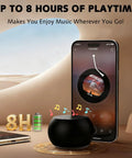 Pocket Sized Bluetooth Speaker With Deep Bass And Crisp Highs, 5W Stereo Sound next to smartphone displaying music app, IP7 Waterproof.