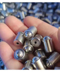Top Shelf 304 Stainless Steel Spring Ball Plunger D12XL16 Press In Positioning Screw Five Piece Set in hand.
