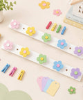Tot Approved Flower Shaped Kids Coat Rack 2 Piece Wall Hook Set Rainbow Colors with floral designs for kids storage.