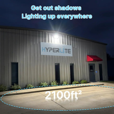Built Tough 120W LED Wall Pack Light With Crisp Glass Lens And Auto Dusk To Dawn Sensor For Kickass Outdoor Security And Yard Patio Flood Lighting UL Listed illuminating a commercial building at night.