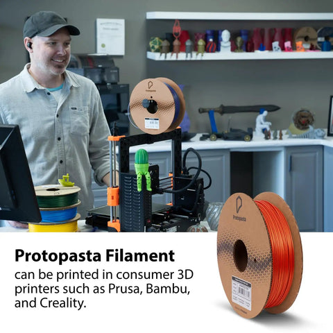 Premium 3D Printer PLA Filament 1.75 Mm Tangerine Orange Metallic Gold Shifter That Prints Like A Dream Delivers A Next Level Smooth Roll And Gives Your Creations A Killer Real Metal Finish Every Time 500 Gram Spool displayed on a 3D printer with spools nearby.