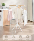 Foldable Wood Clothes Drying Rack With Eight Adjustable Rods No Fuss Space Saving Laundry Organizer For Indoor And Outdoor Use Ideal For Laundry Room Balcony RV Camping Beach Towel Drying shown in laundry room with clothes hanging