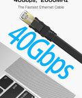 Cat 8 Ethernet Cable 100 Ft Flat Patch Cord Shielded Outdoor Indoor RJ45 High Speed 40Gbps 2000MHz near a laptop