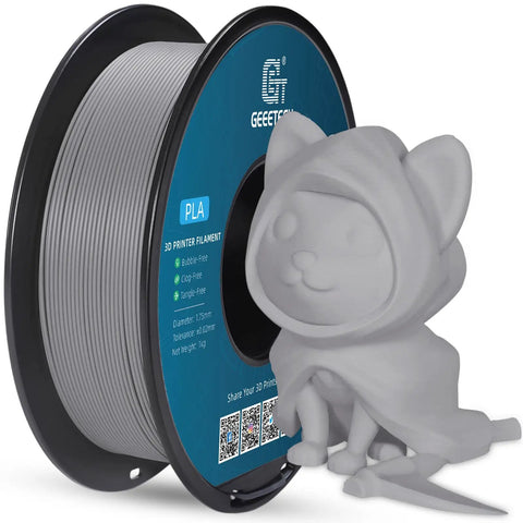 Premium Matte PLA Filament In Sleek Grey 1.75Mm 1Kg Spool with 3D printed cat figurine in matte finish.