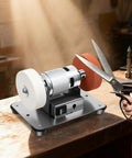 Badass 96W Mini Belt Sander And Bench Grinder With Variable Speed Control For Metal Work And Knife Sharpening compact tool in workshop.
