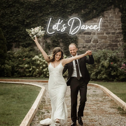 Couple dancing under Dimmer Neon Sign For Wall Decor 21.3 By 17.3 Inch LED 3D Light In Cold White Perfect For Bedroom Bar Wedding Or Party Vibe Great Gift For Lovers And Friends Brighten Up Your Space With A Dope Neon Look.