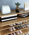 Ten Tier Stackable Shoe Rack With Top Storage Bin Vertical Narrow Shoe Organizer For Entryway Closet with shoes and accessories.