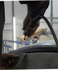 Person using Pro-Grade Seamless Electric Welding Hammer Kit With High-Strength Welding Magnets And Precision Iron Needle for repair