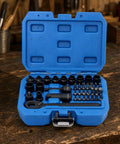 Boss Level 37 Pc Quarter Inch Drive Pass Through Ratchet Socket Set Featuring Bidirectional Metric Wrenches Rotating Handle Extension Bar And Quick Release Alloy Steel Toolbox inside blue case.
