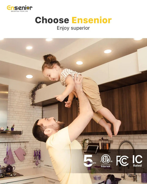 Man lifting child in kitchen under Six Pack 4 Inch LED Recessed Light Dimmable 5000K Daylight 750LM Ultra Thin Canless Wafer Ceiling Light