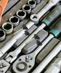 Five Piece M8 X 50 Millimeter Thumb Screw Kit With Wing Knobs displayed among tools for easy access and use.