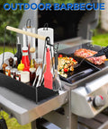 Grill Caddy With Dual Paper Towel Holders For Outdoor BBQs next to a grilling station with cooking utensils and condiments.