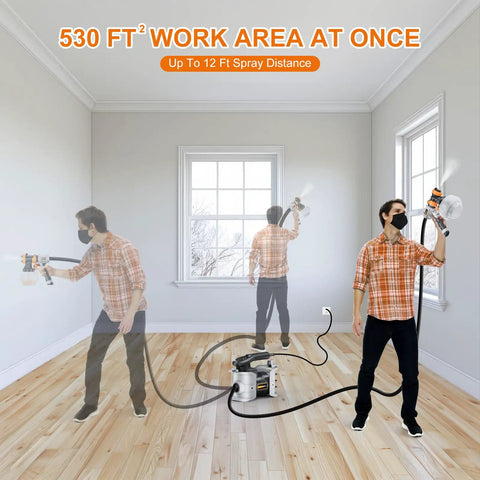 Man using Powerful 700W Electric Paint Sprayer With 1200ml Capacity in large room, showcasing wide spray area and reach.