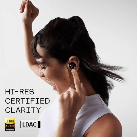 Woman enjoying music with Buds Pro 2 Wireless Earbuds With Smart Dial 50dB Adaptive Hybrid Noise Cancelling Bluetooth 5.3