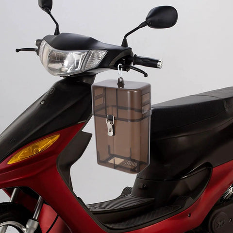 Built Tough Weatherproof Connector Box For Outdoor EV Chargers Drip Free Plug Socket Guard Black plastic housing mounted on scooter.